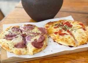 Experimente as pizzas do quiosque Voo Livre